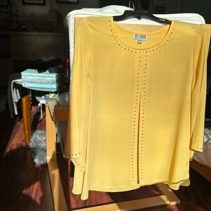 Women’s top size L, $15 each